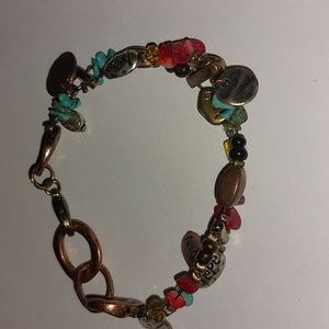 Bracelet of genuine turquoise and coral stones